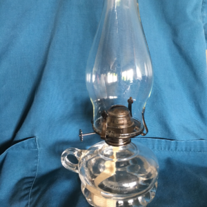 Oil Lamp on Nursing Uniform - a symbol of Nursing